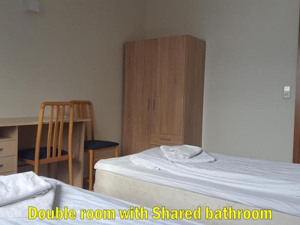 The wardrobe in the double room with a shared bathroom.