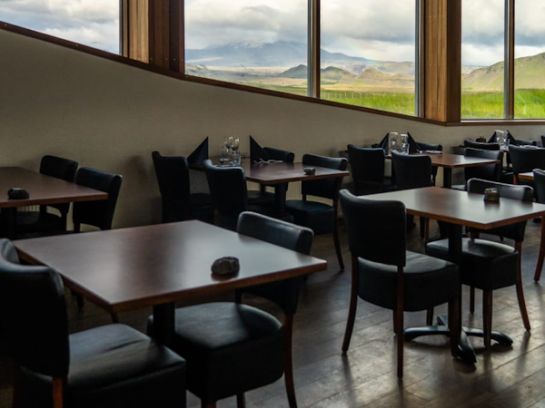 Enjoy delicious meals when dining at the on-site restaurant of Hotel Leirubakki in Iceland.