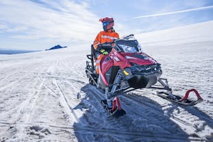 A rider on a snowmobile on the Langjokull glacier in Iceland's Highlands.