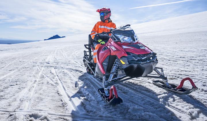 Hop on a snowmobile in Iceland and explore the snowy plains of Langjokull glacier.
