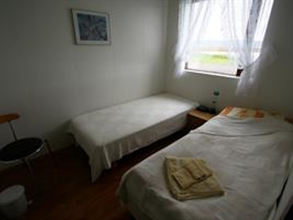 Kirkjubol - Holmavik is a guesthouse in the southeast Westfjords with simple double or twin rooms with a shared bathroom.