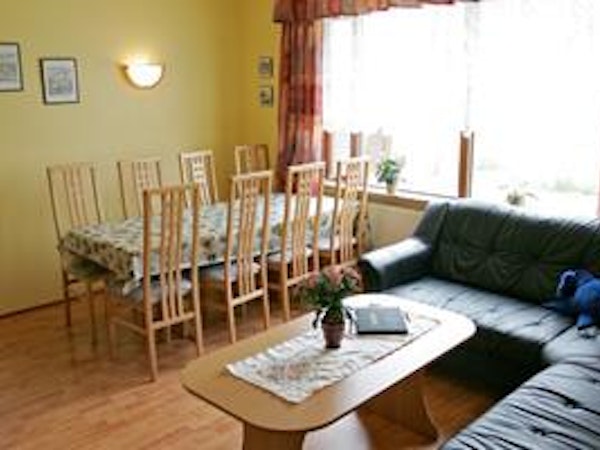 Kirkjubol - Holmavik has a shared dining and living area with comfortable sofas.