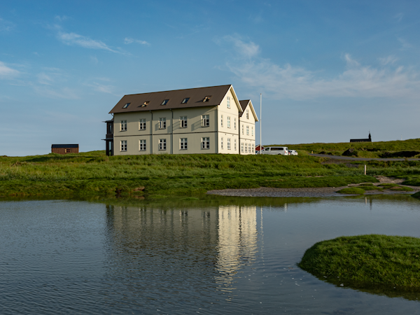 Hotel Budir sits against the water of the Snaefellsnes Peninsula.