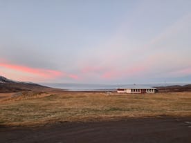 The grounds of Hotel Hvitserkur in North Iceland at sunset.