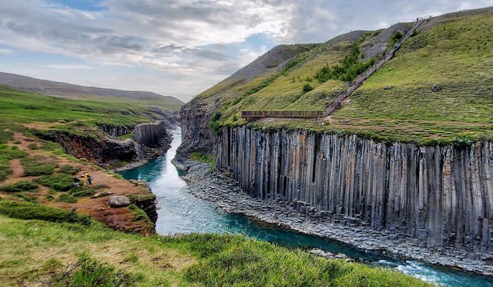 The Studalagil canyon is one of the most stunning destinations in East Iceland, with its towering basalt columns and water flowing below.