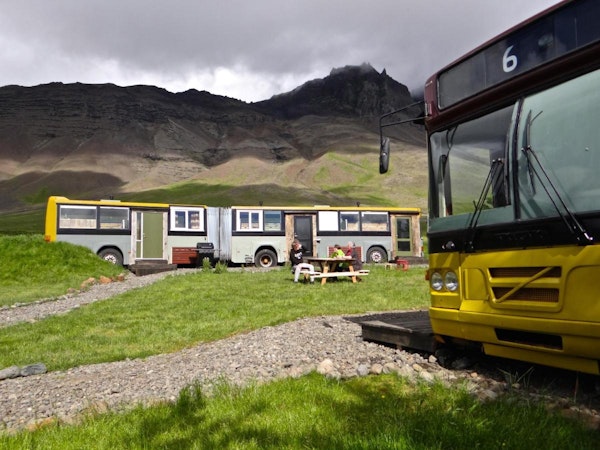 Esjan offers a unique glamping experience in converted buses at the base of Mount Esja near Reykjavik.