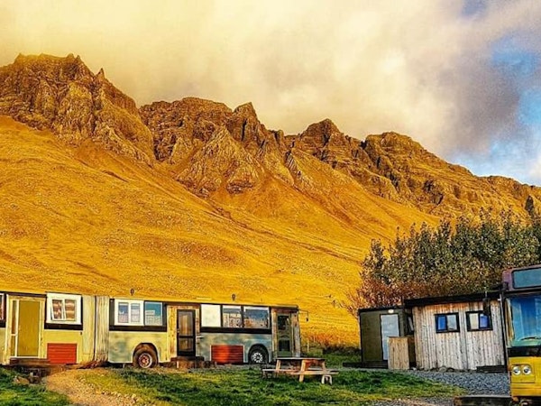 Esjan glamping accommodation near Reykjavik boasts an idyllic countryside setting with Esja mountain as the backdrop.