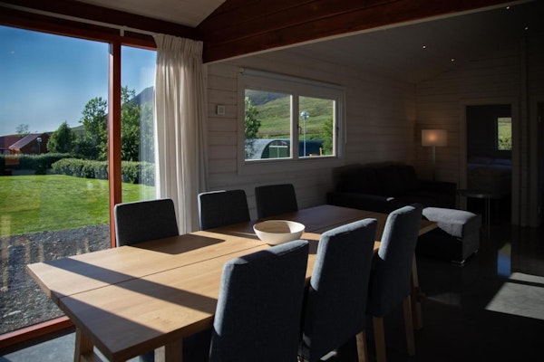 The dining room table in each cabin at Dalasetur seats six people and features excellent nature views out the window.