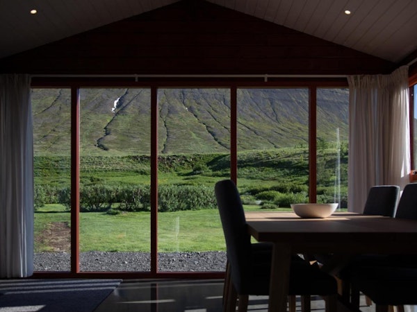 Marvel at the stunning mountain scenery as you enjoy your meal from your dining table at Dalasetur.