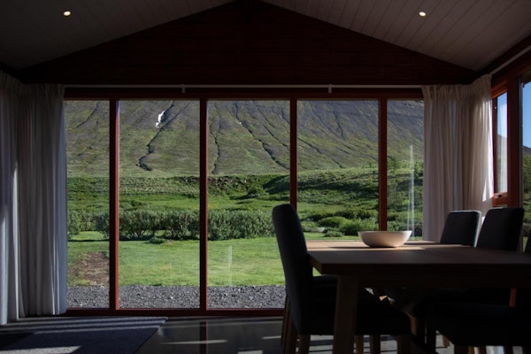 Marvel at the stunning mountain scenery as you enjoy your meal from your dining table at Dalasetur.