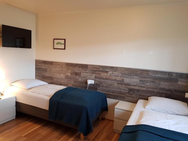 Guests can choose a double or twin room set up at Guesthouse Mikael.
