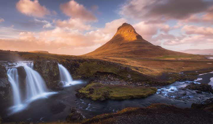 Kirkjufell Mountain on the Snaefellsnes Peninsula with a nearby waterfall.