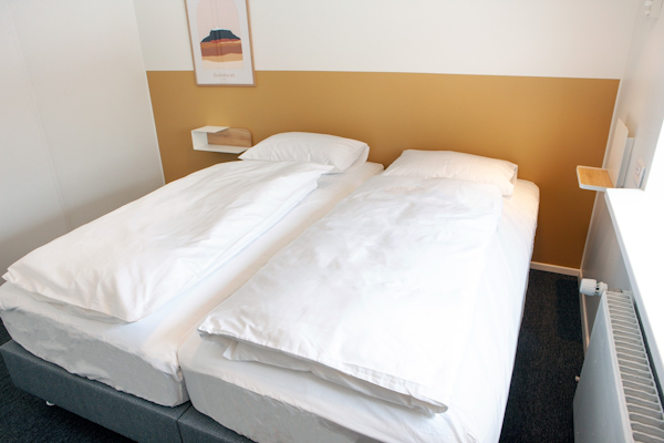 The beds at Eidar Hostel & Apartments make guests comfortable after a tiring day.