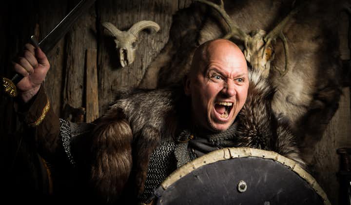 See artifacts and pieces of Viking clothing while exploring the Settlement Museum in Reykjavik.