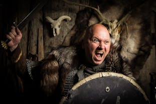 See artifacts and pieces of Viking clothing while exploring the Settlement Museum in Reykjavik.