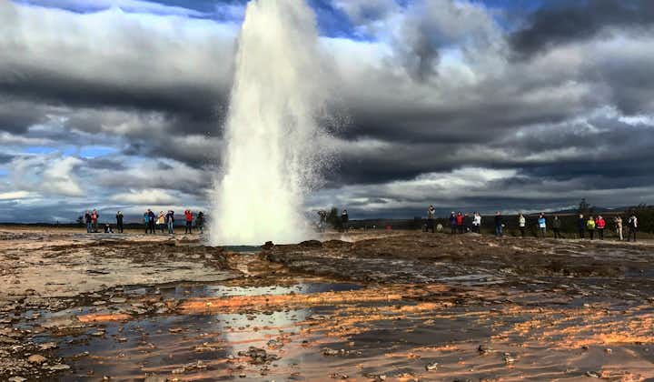 Watch the Strokkur geyser shoot superheated waters in the Golden Circle.