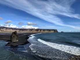 Iceland's South Coast is home to gorgeous black-sand beaches, such as the world-famous Reynisfjara beach.