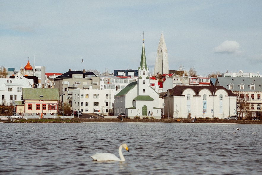 Frikirkjan church alongside other buildings along the waterfront in Reykjavik.