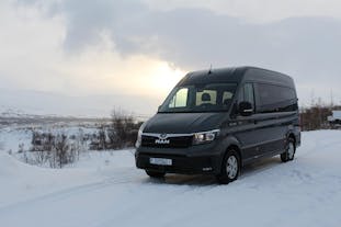 The vehicle for this private transfer from Akureyri Airport can traverse snowy roads.