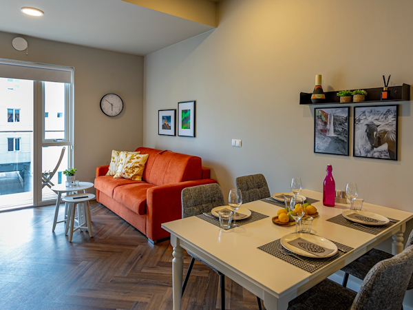 One of the open-plan living and dining areas at SJF Apartments.