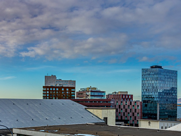 The view from SJF Apartments over the rooftops of Reykjavik.