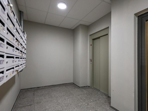 A hallway with key boxes at Center Apartments in Reykjavik.