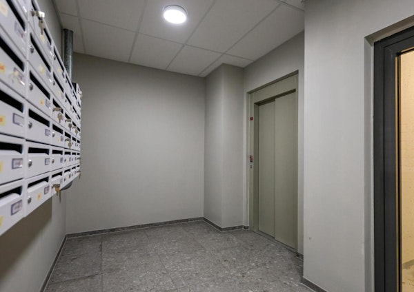 A hallway with key boxes at Center Apartments in Reykjavik.