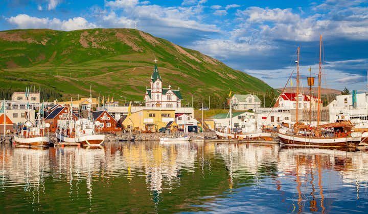 Husavik is a charming North Iceland town with a pretty harbor front and church, and the hills as its backdrop.