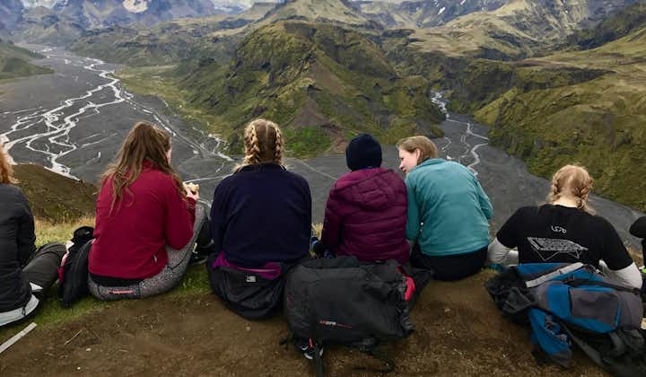 A group of hikers enjoying the view at Thorsmork Nature Reserve.
