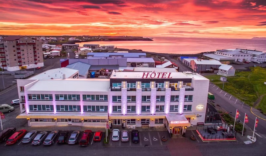 Building of Hotel Keflavik with a sunset in the background